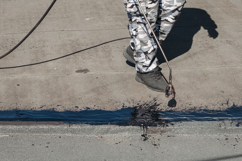 Signs Your Building Needs A Tar Roof Torchdown Installation