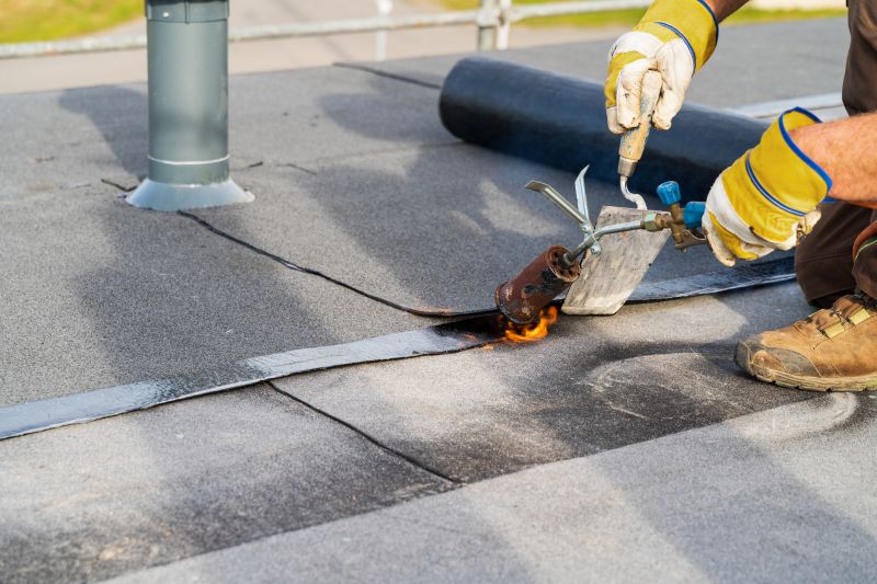 Signs Your Building Needs A Tar Roof Torchdown Installation